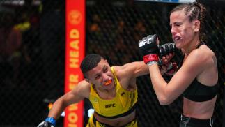 Josiane Nunes of Brazil knocks out Bea Malecki in their bantamweight matchup at UFC Fight Night: Cannonier vs Gastelum on August 21 2021 in Las Vegas Nevada. (Photo by Chris Unger/Zuffa LLC)