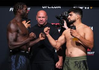 Jared Cannonier and Kelvin Gastelum face off during the UFC Fight Night weigh-in at UFC APEX on August 20, 2021 in Las Vegas, Nevada. (Photo by Chris Unger/Zuffa LLC)