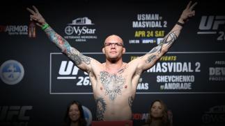 Anthony Smith poses on the scale during the ceremonial UFC 261 weigh-in at VyStar Veterans Memorial Arena on April 23, 2021 in Jacksonville, Florida. (Photo by Josh Hedges/Zuffa LLC)