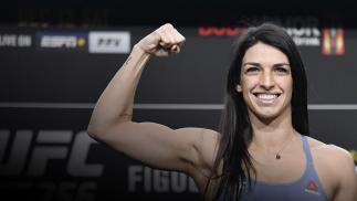 Mackenzie Dern poses on the scale during the UFC 256 weigh-in at UFC APEX on December 11, 2020 in Las Vegas, Nevada. (Photo by Jeff Bottari/Zuffa LLC via Getty Images)