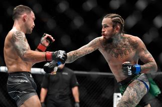 Marlon Vera of Ecuador punches Frankie Edgar in their bantamweight fight during the UFC 268 event at Madison Square Garden on November 06, 2021 in New York City. (Photo by Chris Unger/Zuffa LLC)