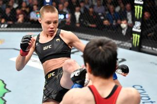 Rose Namajunas kicks Zhang Weili of China in their UFC strawweight championship fight during the UFC 268 event at Madison Square Garden on November 06, 2021 in New York City. (Photo by Jeff Bottari/Zuffa LLC)