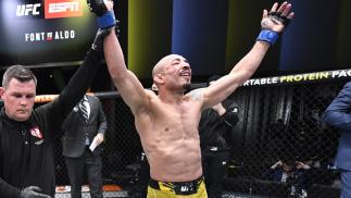 Jose Aldo of Brazil reacts after his victory over Rob Font in their bantamweight fight during the UFC Fight Night event at UFC APEX on December 04, 2021 in Las Vegas, Nevada. (Photo by Jeff Bottari/Zuffa LLC)