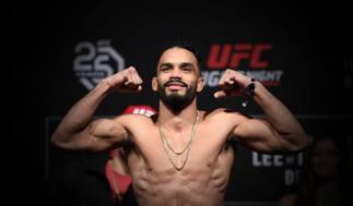 Rob Font poses on the scale during the UFC Fight Night weigh-in at Fiserv Forum on December 14, 2018 in Milwaukee, Wisconsin. (Photo by Jeff Bottari/Zuffa LLC)