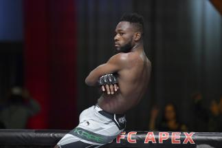 Manel Kape of Angola reacts after his knockout victory over Zhalgas Zhumagulov of Kazakhstan in their flyweight fight during the UFC Fight Night event at UFC APEX on December 04, 2021 in Las Vegas, Nevada. (Photo by Jeff Bottari/Zuffa LLC)