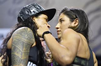Opponents Amanda Nunes of Brazil and Julianna Pena face off during the UFC 269 ceremonial weigh-in at MGM Grand Garden Arena on December 10, 2021 in Las Vegas, Nevada. (Photo by Chris Unger/Zuffa LLC)