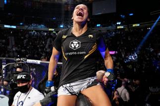 Julianna Pena celebrates her victory over Amanda Nunes of Brazil in their UFC bantamweight championship bout during the UFC 269 on December 11, 2021 in Las Vegas, Nevada. (Photo by Jeff Bottari/Zuffa LLC)