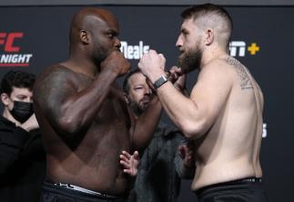 Derrick Lewis and Chris Daukaus face off during the UFC Fight Night weigh-in at UFC APEX on December 17, 2021 in Las Vegas, Nevada. (Photo by Jeff Bottari/Zuffa LLC)