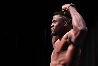 Francis Ngannou of Cameroon poses on the scale during the UFC Fight Night weigh-in at the Comerica Theatre on February 16, 2019 in the Phoenix, AZ