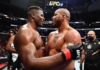 Francis Ngannou of Cameroon and Ciryl Gane of France talk after their UFC heavyweight championship fight during the UFC 270 event at Honda Center on January 22, 2022 in Anaheim, California. (Photo by Chris Unger/Zuffa LLC)
