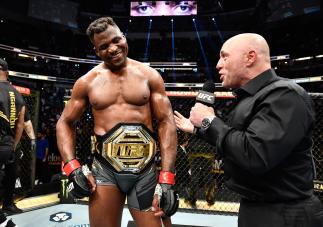 Francis Ngannou of Cameroon celebrates after his victory over Ciryl Gane of France in their UFC heavyweight championship fight during the UFC 270 event at Honda Center on January 22, 2022 in Anaheim, California. (Photo by Chris Unger/Zuffa LLC)