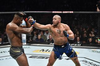 UFC Heavyweight Ciryl Gane Reacts With Joe Rogan After His Unanimous Decision Loss To Francis Ngannou In His UFC Heavyweight Unification Bout At UFC 270: Ngannou vs Gane. (Photo by Chris Unger/Zuffa LLC)