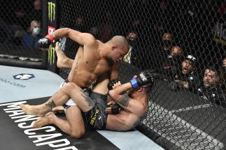 UFC Bantamweight Tony Gravely Punches Saimon Oliveira of Brazil At UFC 270: Ngannou vs Gane On January 22, 2022. (Photo by Chris Unger/Zuffa LLC)