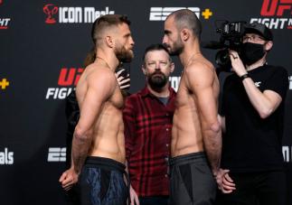 Opponents Calvin Kattar and Giga Chikadze of Georgia face off during the UFC Fight Night weigh-in at UFC APEX on January 14, 2022 in Las Vegas, Nevada. (Photo by Jeff Bottari/Zuffa LLC)