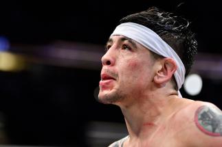 Brandon Moreno of Mexico reacts after his decision loss to Deiveson Figueiredo of Brazil in their UFC flyweight championship fight during the UFC 270 event at Honda Center on January 22, 2022 in Anaheim, California. (Photo by Chris Unger/Zuffa LLC)