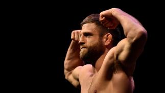 Calvin Kattar poses on the scale during the UFC 220 weigh-in at TD Garden on January 19, 2018 in Boston, Massachusetts. (Photo by Brandon Magnus/Zuffa LLC/Zuffa LLC via Getty Images)