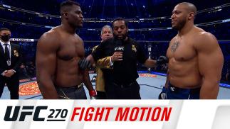 Encarada entre Francis Ngannou e Ciryl Gane no Octógono com uma tarja em que se lê: UFC 270 Fight Motion