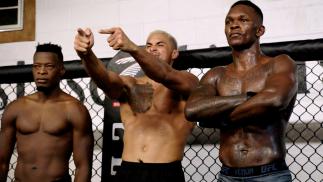 UFC middleweight champion Israel Adesanya, UFC light heavyweight Carlos Ulberg and UFC welterweight Blood Diamond of City Kickboxing pose for a picture ahead of UFC 271: Adesanya vs Whittaker 2.