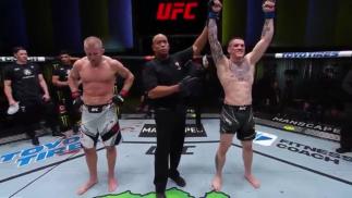 Wellington Turman talks with Michael Bisping after his win at UFC Fight Night