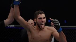 Fares Ziam of France celebrates his victory over Jamie Mullarkey of Australia in their lightweight bout during the UFC Fight Night event inside Flash Forum on UFC Fight Island on October 18, 2020 in Abu Dhabi, United Arab Emirates. (Photo by Josh Hedges/Zuffa LLC)