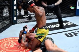 Jailton Almeida of Brazil punches Danilo Marques of Brazil in their light heavyweight fight during the UFC Fight Night event at UFC APEX on February 05, 2022 in Las Vegas, Nevada. (Photo by Chris Unger/Zuffa LLC)