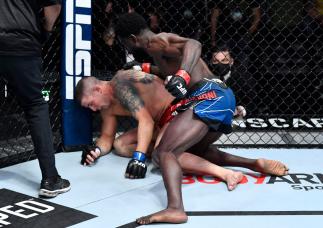 Chidi Njokuani punches Marc-Andre Barriault of Canada in their middleweight fight during the UFC Fight Night event at UFC APEX on February 05, 2022 in Las Vegas, Nevada. (Photo by Chris Unger/Zuffa LLC)