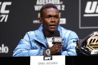 Israel Adesanya of Nigeria interacts with media during the UFC 271 press conference at George R. Brown Convention Center on February 10, 2022 in Houston, Texas. (Photo by Josh Hedges/Zuffa LLC)