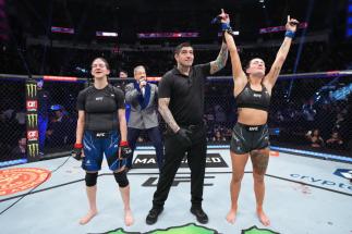 Casey O'Neill of United Kingdom reacts after defeating Roxanne Modafferi in their flyweight fight during the UFC 271 event at Toyota Center on February 12, 2022 in Houston, Texas. (Photo by Josh Hedges/Zuffa LLC)