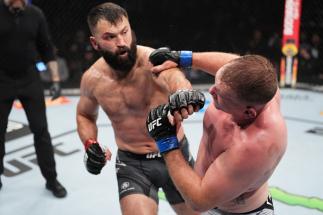 Andrei Arlovski of Belarus punches Jared Vanderaa in their heavyweight fight during the UFC 271 event at Toyota Center on February 12, 2022 in Houston, Texas. (Photo by Josh Hedges/Zuffa LLC)