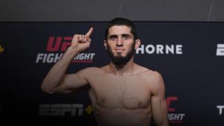 Islam Makhachev poses on the scale during the UFC Fight Night weigh-in at UFC APEX on July 16, 2021 in Las Vegas, Nevada. (Photo by Jeff Bottari/Zuffa LLC)