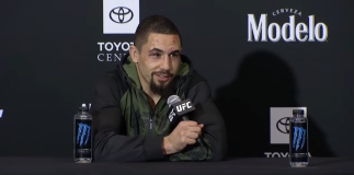 Robert Whittaker addresses the media after being defeated by Israel Adesanya at UFC 271: Adesanya vs Whittaker 2