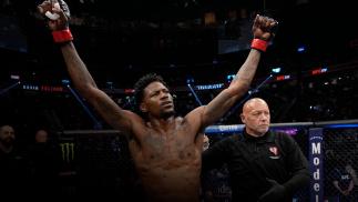 Kevin Holland reacts after his victory over Alex Oliveira of Brazil in their welterweight fight during the UFC 272 event on March 05, 2022 in Las Vegas, Nevada. (Photo by Jeff Bottari/Zuffa LLC)