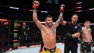Matheus Nicolau of Brazil celebrates his victory over David Dvorak of Czech Republic in a flyweight fight during the UFC Fight Night event at Nationwide Arena on March 26, 2022 in Columbus, Ohio. (Photo by Josh Hedges/Zuffa LLC)