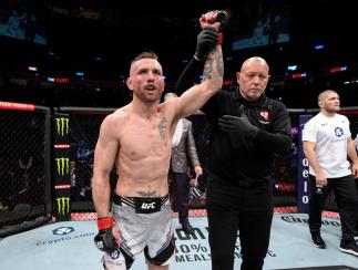Tim Elliott reacts after his victory over Tagir Ulanbekov of Russia in their flyweight fight during the UFC 272 event on March 05, 2022 in Las Vegas, Nevada. (Photo by Jeff Bottari/Zuffa LLC)