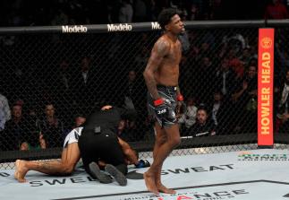 Kevin Holland reacts after his victory over Alex Oliveira of Brazil in their welterweight fight during the UFC 272 event on March 05, 2022 in Las Vegas, Nevada. (Photo by Jeff Bottari/Zuffa LLC)