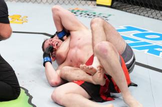 Aliaskhab Khizriev of Russia submits Denis Tiuliulin of Russia in a middleweight fight during the UFC Fight Night event at Nationwide Arena on March 26, 2022 in Columbus, Ohio. (Photo by Josh Hedges/Zuffa LLC)