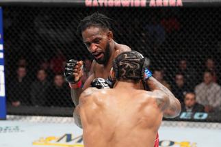 Neil Magny punches Max Griffin in a welterweight fight during the UFC Fight Night event at Nationwide Arena on March 26, 2022 in Columbus, Ohio. (Photo by Josh Hedges/Zuffa LLC)