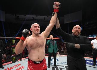 Aleksei Oleinik gets his hand raised after defeating Jared Vanderaa