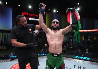 Belal Muhammad talks with Daniel Cormier after his win over Vicente Luque in the main event of UFC Fight Night: Luque vs Muhammad 2.