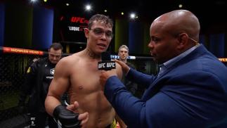 Caio Borralho talks with Daniel Cormier after his co-main event win at UFC Fight Night: Luque vs Muhammad 2