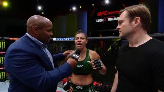 Mayra Bueno Silva talks with Daniel Cormier after winning at UFC Fight Night: Luque vs Muhammad 2