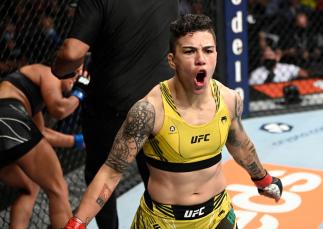 Jessica Andrade of Brazil celebrates her win over Cynthia Calvillo in their flyweight fight during the UFC 266 event on September 25, 2021 in Las Vegas, Nevada. (Photo by Jeff Bottari/Zuffa LLC)