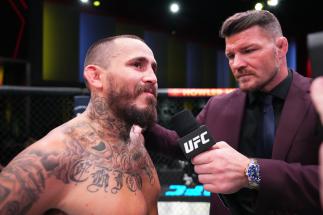 Marlon Chito Vera talks with Micahel Bisping after his win in the Octagon after his win over Rob Font at UFC Fight Night: Font vs Vera