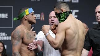 Opponents Gilbert Burns of Brazil and Khamzat Chimaev of Russia face off during the UFC 273 ceremonial weigh-in at VyStar Veterans Memorial Arena on April 08, 2022 in Jacksonville, Florida. (Photo by Jeff Bottari/Zuffa LLC)