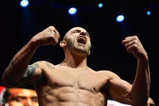 Alexander Volkanovski of Australia poses on stage during the UFC 266 ceremonial weigh-in at Park Theater on September 24, 2021 in Las Vegas, Nevada. (Photo by Chris Unger/Zuffa LLC)