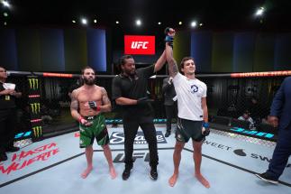 Claudio Puelles celebrates his victory at UFC Fight Night: Lemos vs Andrade on April 23, 2022 (Photo by Jeff Bottari/Zuffa LLC)