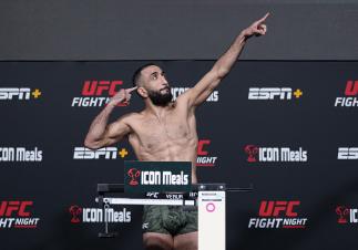 Belal Muhammad poses on the scale during the UFC weigh-in at UFC APEX on April 15, 2022 in Las Vegas, Nevada. (Photo by Jeff Bottari/Zuffa LLC)