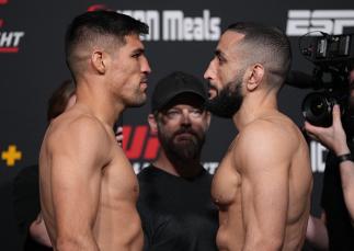 Opponents Vicente Luque of Brazil and Belal Muhammad face off during the UFC weigh-in at UFC APEX on April 15, 2022 in Las Vegas, Nevada. (Photo by Jeff Bottari/Zuffa LLC)