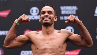 Rob Font steps on the scale during the UFC 198 weigh-in at Arena da Baixada stadium on May 13, 2016 in Curitiba, Parana, Brazil. (Photo by Josh Hedges/Zuffa LLC)
