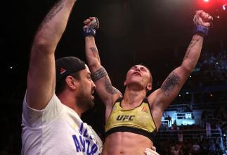 Jessica Andrade of Brazil celebrates after her knockout victory over Rose Namajunas in their women's strawweight championship bout during the UFC 237 event at Jeunesse Arena on May 11, 2019 in Rio De Janeiro, Brazil. (Photo by Buda Mendes/Zuffa LLC/Zuffa LLC via Getty Images)